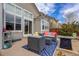 The backyard features a patio with comfortable seating, perfect for enjoying the outdoors at 11081 Cannonade Dr, Parker, CO 80138