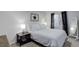 This bedroom features a queen-sized bed with soft bedding and stylish decor, creating a relaxing retreat at 11081 Cannonade Dr, Parker, CO 80138