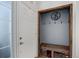 Entryway features a built-in bench with hooks and storage baskets, offering a practical and organized space at 11081 Cannonade Dr, Parker, CO 80138