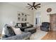 Comfortable living room with a vaulted ceiling, modern decor and a barn door, offering a relaxing atmosphere at 11081 Cannonade Dr, Parker, CO 80138