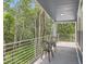 Covered porch with seating area and scenic views, ideal for relaxing and enjoying the outdoors at 629 Copperdale Ln, Golden, CO 80401
