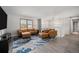 Bright living room boasting a large window, comfortable seating, and modern decor at 10473 W Arkansas Dr, Lakewood, CO 80232