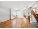 Spacious living area with hardwood floors, and large windows at 9036 W Wisconsin Ave, Lakewood, CO 80232