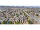 Expansive aerial shot of a residential area surrounded by natural beauty at 9390 W Chatfield Pl # 108, Littleton, CO 80128