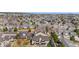 Breathtaking aerial perspective of a neighborhood with tree-lined streets and manicured lawns at 9390 W Chatfield Pl # 108, Littleton, CO 80128