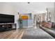 Spacious living room open to the dining area and kitchen, perfect for entertaining at 9390 W Chatfield Pl # 108, Littleton, CO 80128