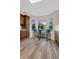 Charming breakfast nook with a table for two and natural light streaming through bay windows at 8940 W 80Th Dr, Arvada, CO 80005