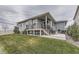 Landscaped backyard with a deck, patio, well-maintained lawn and tasteful plantings at 5775 Pinto Valley St, Parker, CO 80134