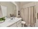 Well-lit bathroom featuring a modern vanity, ample counter space, and shower with tub at 5775 Pinto Valley St, Parker, CO 80134