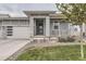 Charming home with a modern front exterior, featuring a two-car garage and inviting porch at 5775 Pinto Valley St, Parker, CO 80134