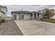 Attractive two-story home showcasing a spacious driveway, two-car garage and inviting facade at 5775 Pinto Valley St, Parker, CO 80134