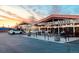 View of La Fillette Bakery showing storefront and parking area at 1434 Clermont St, Denver, CO 80220
