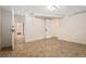Spacious basement room featuring vinyl flooring and multiple doorways at 1434 Clermont St, Denver, CO 80220