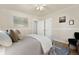 Bedroom featuring neutral walls, hardwood floors, and natural light at 1434 Clermont St, Denver, CO 80220