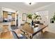 The dining room has a wood table, seating, and decor at 1434 Clermont St, Denver, CO 80220
