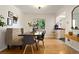 Inviting dining room with bench seating, stylish decor and ample natural light at 1434 Clermont St, Denver, CO 80220