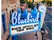 Vintage Bluebird sign and marquee, advertising where artists get their wings, adds retro charm to the street at 1434 Clermont St, Denver, CO 80220