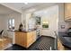 Gourmet kitchen features stainless steel appliances, gas range, black countertops, and tile backsplash at 1434 Clermont St, Denver, CO 80220