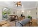 Bright and airy living room with hardwood floors and views of the outdoors at 1434 Clermont St, Denver, CO 80220