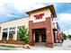 Exterior shot of a Trader Joe's store, showing the building's facade and signage at 1434 Clermont St, Denver, CO 80220