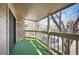 Cozy balcony with green flooring and views of the neighborhood at 8225 Fairmount Dr # 10-204, Denver, CO 80247
