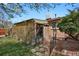 Lush backyard with a well-manicured lawn and shade trees, perfect for relaxing at 65 Reed St, Lakewood, CO 80226