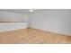 Bright room with hardwood flooring, ceiling fan and neutral decor at 65 Reed St, Lakewood, CO 80226