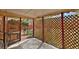 Enclosed patio perfect for outdoor relaxation and entertaining with privacy fencing at 65 Reed St, Lakewood, CO 80226