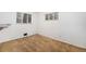 Simple bedroom featuring carpet and dual windows with blinds at 5190 W Mexico Ave, Denver, CO 80219