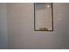 Close up of the shower tiles and inset shelf offering a clean and modern design at 2831 N Perry St, Denver, CO 80212