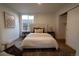 Cozy bedroom with a comfortable bed, neutral decor, and closet at 2831 N Perry St St, Denver, CO 80212