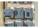 Aerial view of neighborhood homes with solar panels, back patios, yards, and convenient street access at 15774 W Girard Ave, Morrison, CO 80465