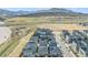 Beautiful aerial view of neighborhood featuring mountain views and convenient highway access at 15774 W Girard Ave, Morrison, CO 80465