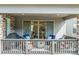 Inviting outdoor patio featuring a grill, a fire pit, comfortable seating, and access to the living room at 15774 W Girard Ave, Morrison, CO 80465