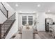 This spacious dining room flows into the kitchen and living room at 15774 W Girard Ave, Morrison, CO 80465