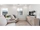 This bright and airy room features comfortable seating with ample sunlight at 15774 W Girard Ave, Morrison, CO 80465