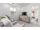 Bright room featuring comfortable seating, soft rug and an abundance of natural light at 15774 W Girard Ave, Morrison, CO 80465