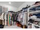 The walk-in closet offers plenty of storage for clothes, shoes, and more at 15774 W Girard Ave, Morrison, CO 80465