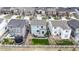 An aerial view of a home, manicured lawn, and neighborhood at 1933 Villageview Ln, Castle Rock, CO 80104