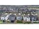 Areal view of a community featuring many two-story homes with fenced yards at 1933 Villageview Ln, Castle Rock, CO 80104