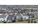 An aerial view of a large, suburban neighborhood featuring homes with fenced yards at 1933 Villageview Ln, Castle Rock, CO 80104