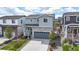 Charming two-story home with stone accents, a two-car garage, and well-maintained landscaping at 1933 Villageview Ln, Castle Rock, CO 80104