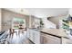 Modern kitchen featuring an island with granite countertops, stainless steel appliances, and open layout at 1933 Villageview Ln, Castle Rock, CO 80104