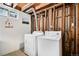 Basement laundry room with a washer and dryer at 3083 S Xanthia St, Denver, CO 80231