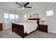 Bedroom featuring carpet, fan, and windows at 719 Robert St, Longmont, CO 80503