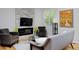 Inviting living room with modern decor, a fireplace, and comfortable seating for relaxing and entertaining at 719 Robert St, Longmont, CO 80503