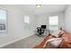 Bright office space offering a comfortable couch, desk and lots of natural light at 719 Robert St, Longmont, CO 80503