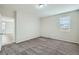 Bedroom with plush carpet, light gray walls, and bright natural light at 13667 Valentia St, Thornton, CO 80602