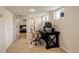 Versatile basement office space with carpeted flooring, natural light, and easy access to other rooms at 848 Harrison St, Denver, CO 80206