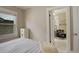 Calm bedroom showcasing a walk-in closet, a comfortable bed, and a tranquil space at 848 Harrison St, Denver, CO 80206